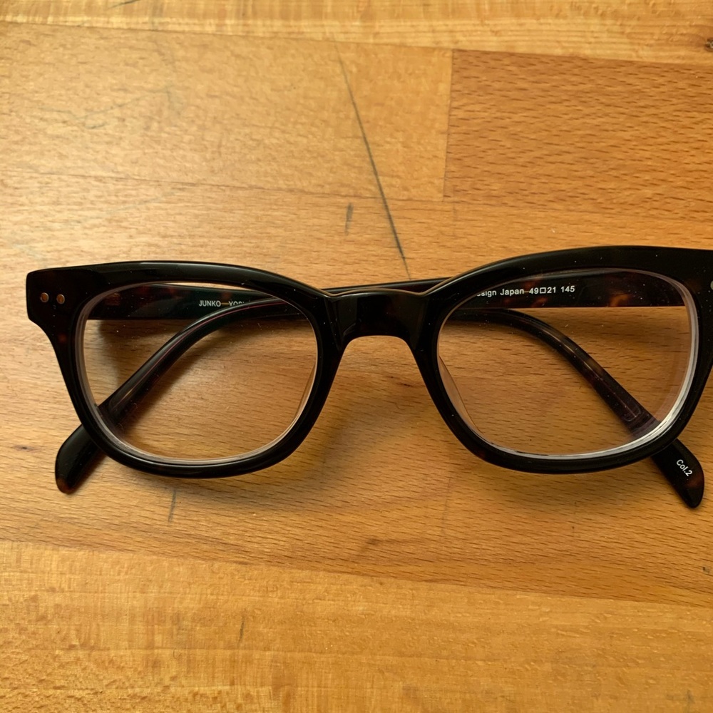 Black thick frame glasses